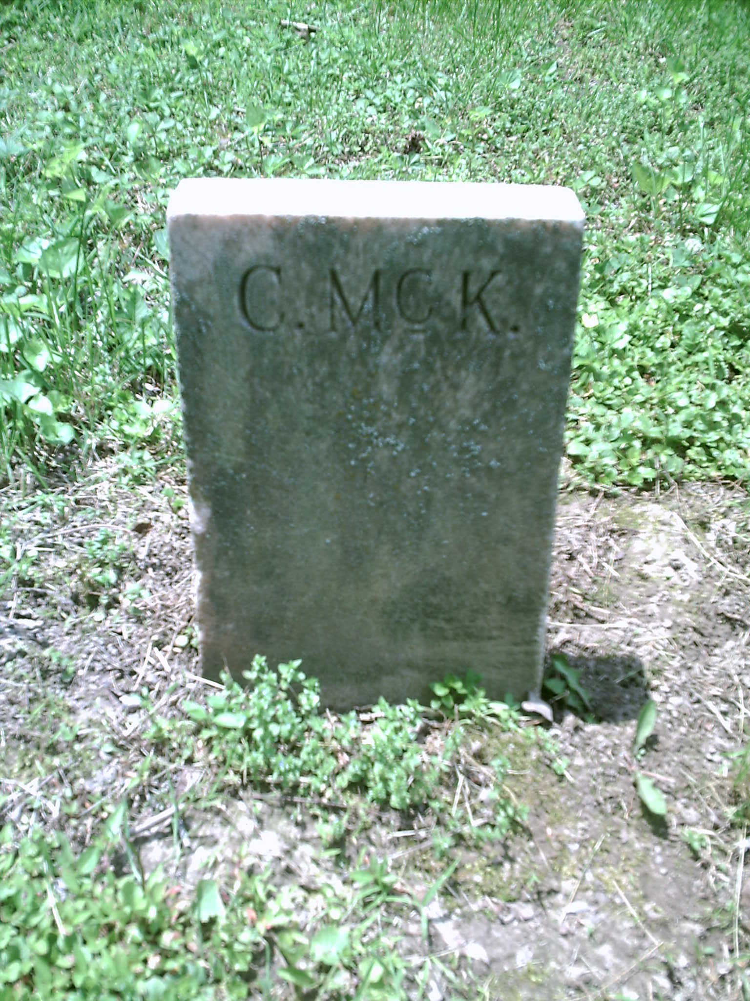 C. McK Headstone